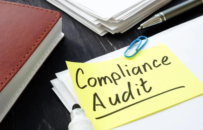 Compliance audit. Stack of papers in the office.