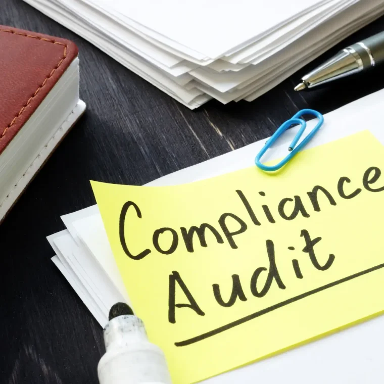 Compliance audit. Stack of papers in the office.