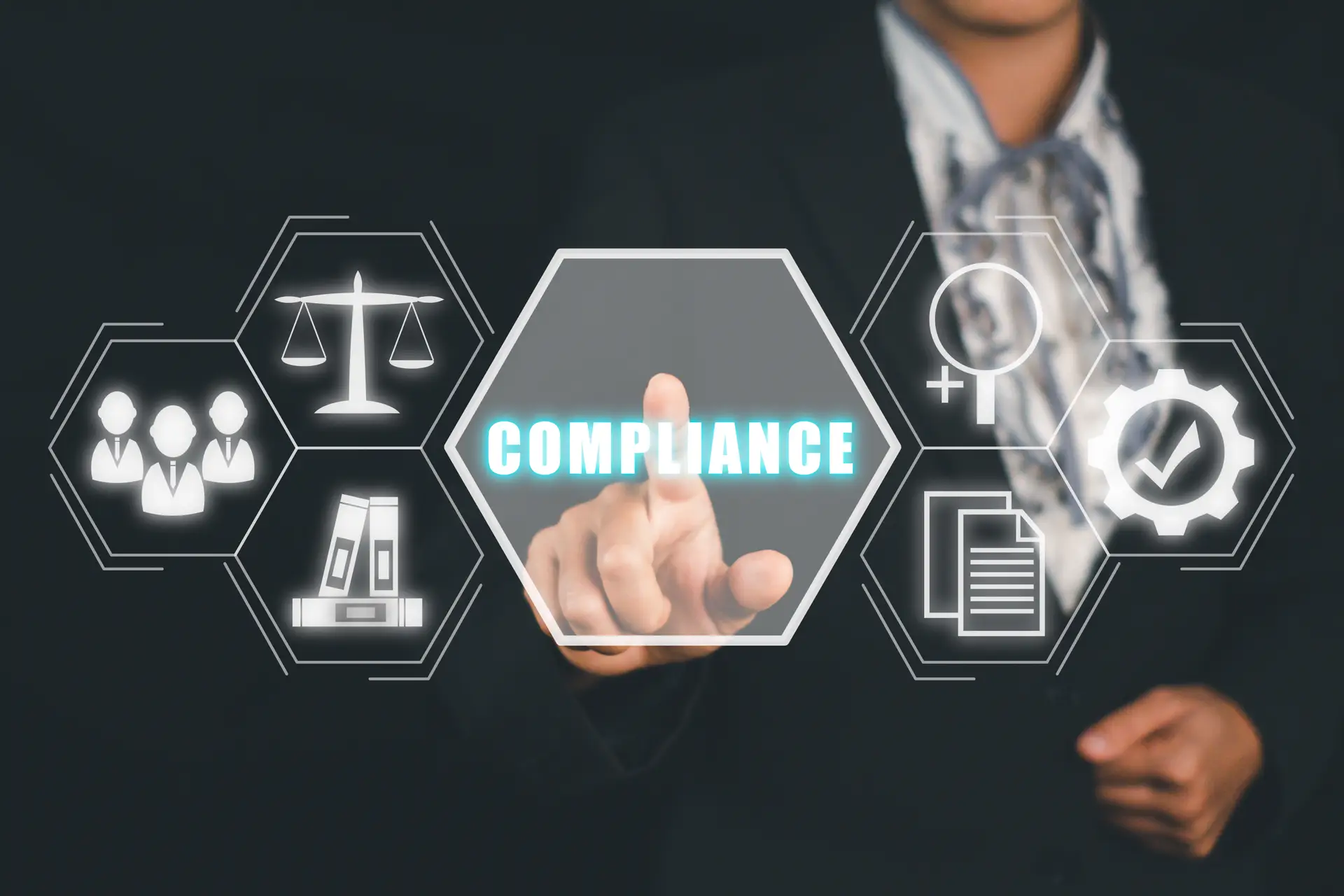 Businesswoman hand touching compliance icon on virtual screen.