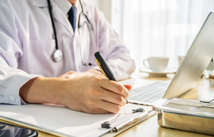 Doctor with paperwork