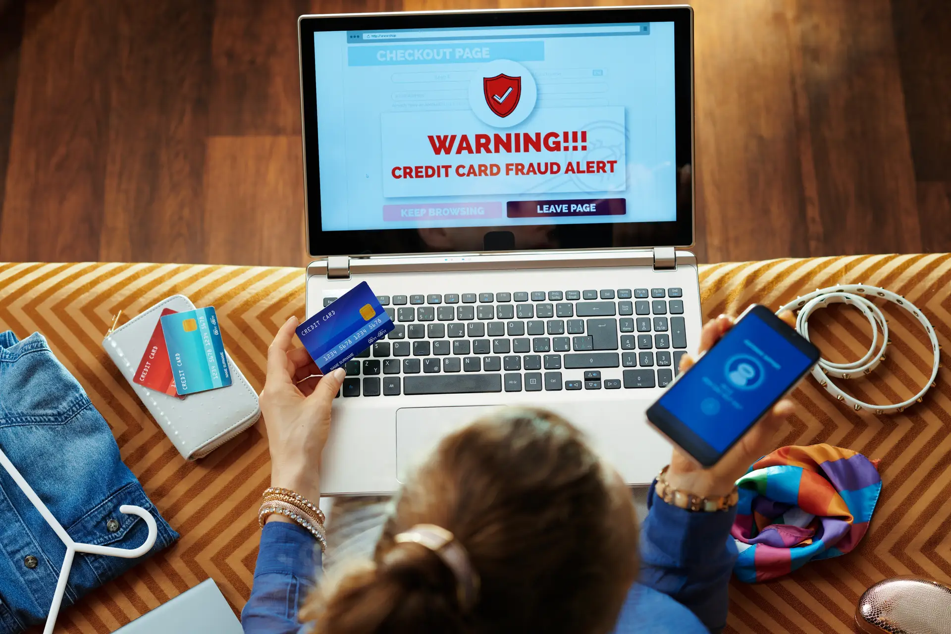 Credit Card Fraud Alert on Laptop